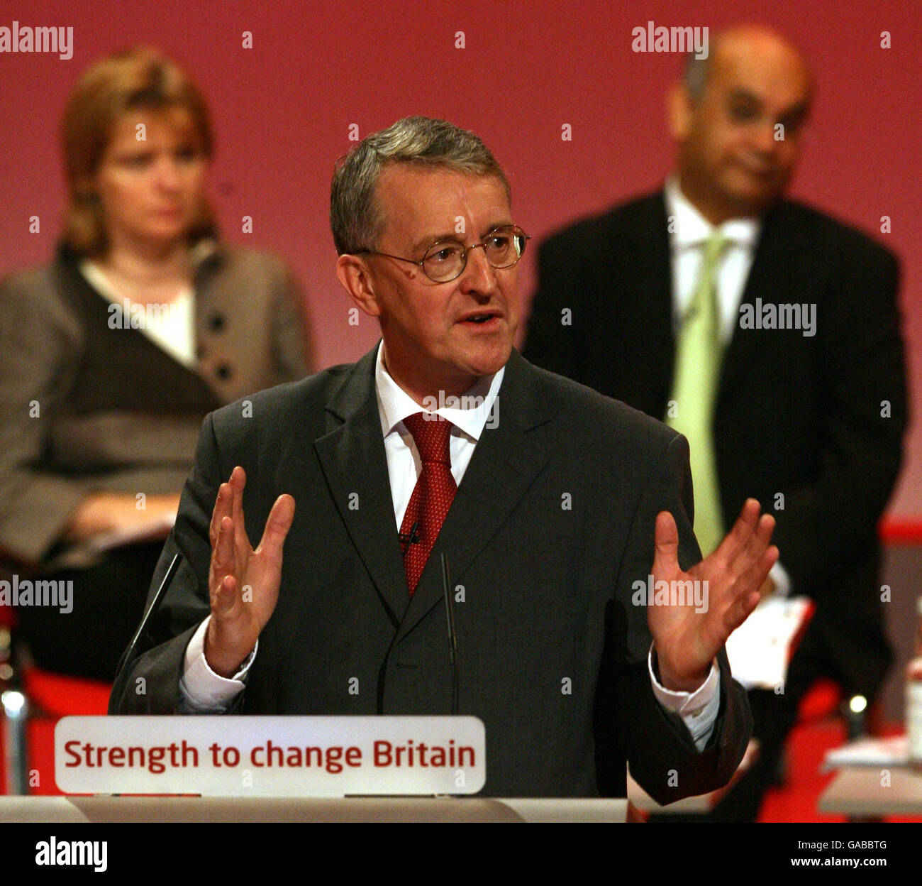 Secretary of State for Environment, Food and Rural Affairs Hilary Benn addresses the 2007 Labour Party Conference at the Bournemouth International Centre, Dorset watched by Ruth Kelly and Keith Vaz. Stock Photo