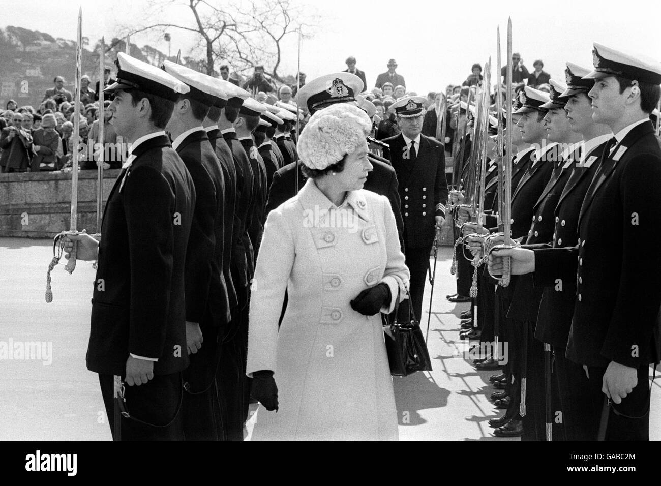 The Queen at Britannia Royal Naval College, inspecting the passing out parade, which included her 20 year old son, Prince Andrew (front row), who has just completed his seven months' Midshipmen's training. Stock Photo