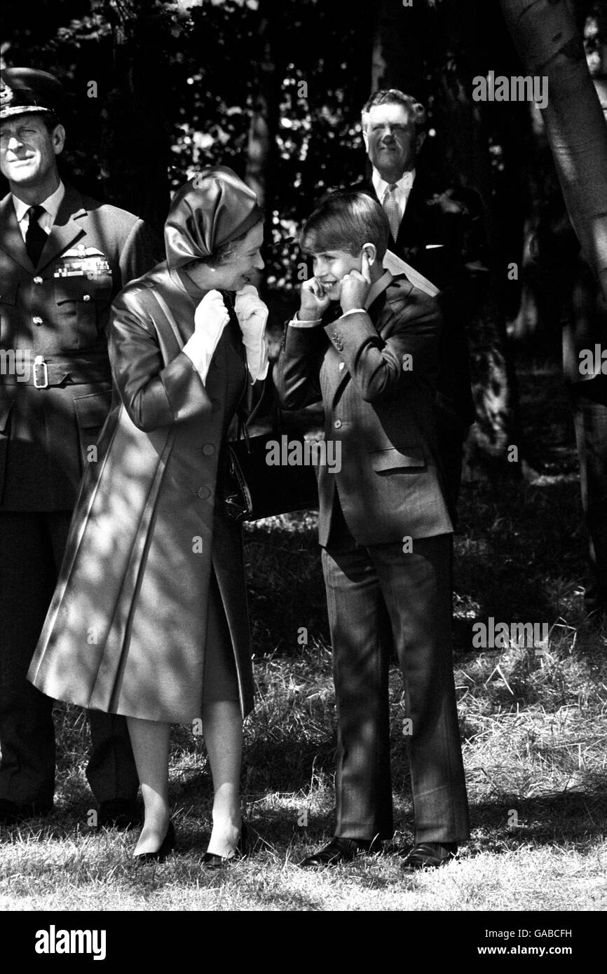 The Queen and Prince Edward shield their ears at RAF Finningley, near Doncaster, during the Silver Jubilee Review of the Royal Air Force. Stock Photo