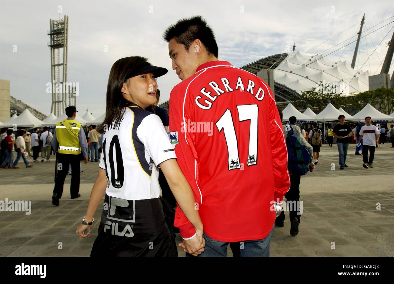 Two Korean fans wearing Michael Owen and Steven Gerrard Liverpool shirts go  to the Jeju World Cup Stadium for the South Korea v England match Stock  Photo - Alamy