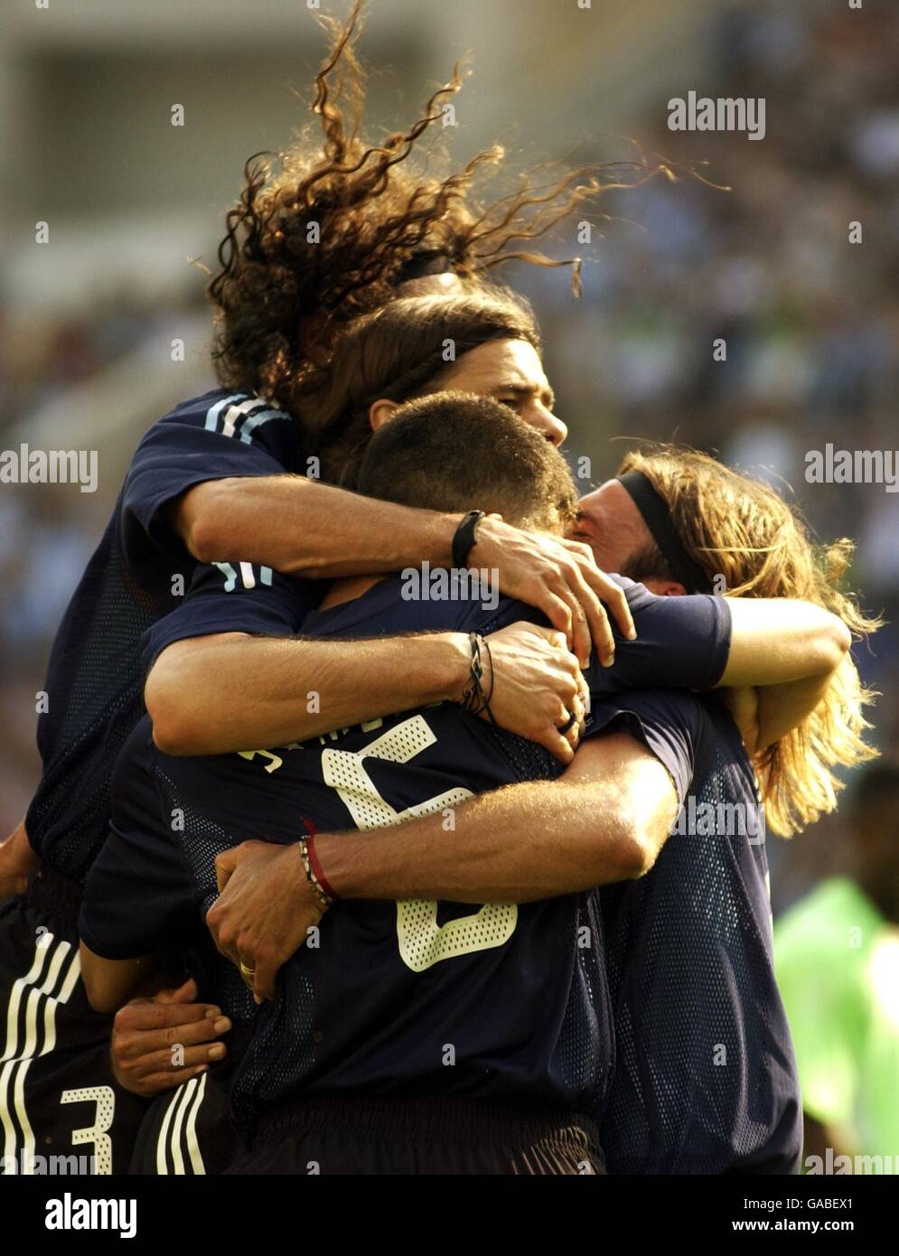 Argentina's Gabriel Batistuta gets congratulated by his team mates after scoring the winning goal Stock Photo