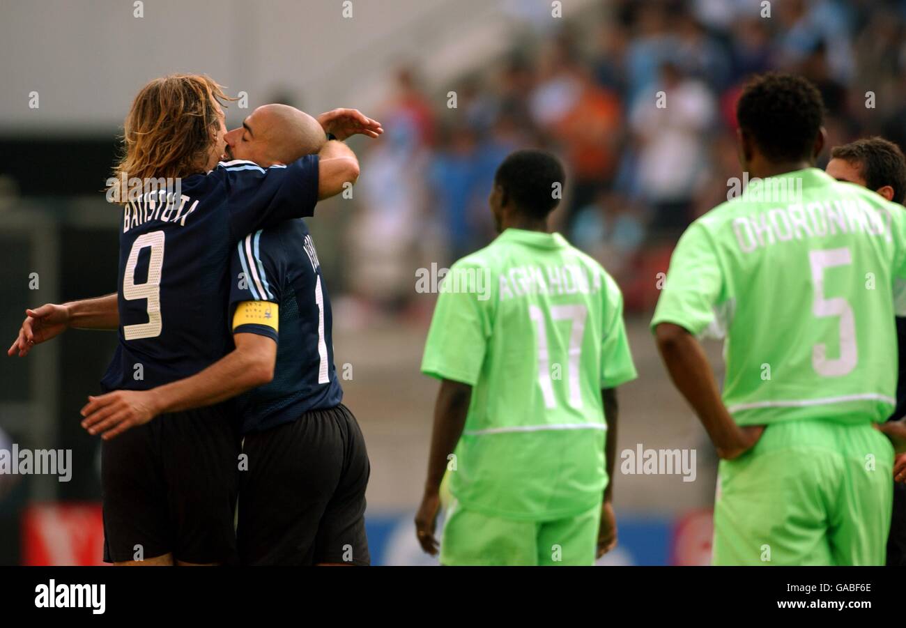 Juan Veron of Argentina hugs Gabriel Batistuta after scoring the winning goal Stock Photo