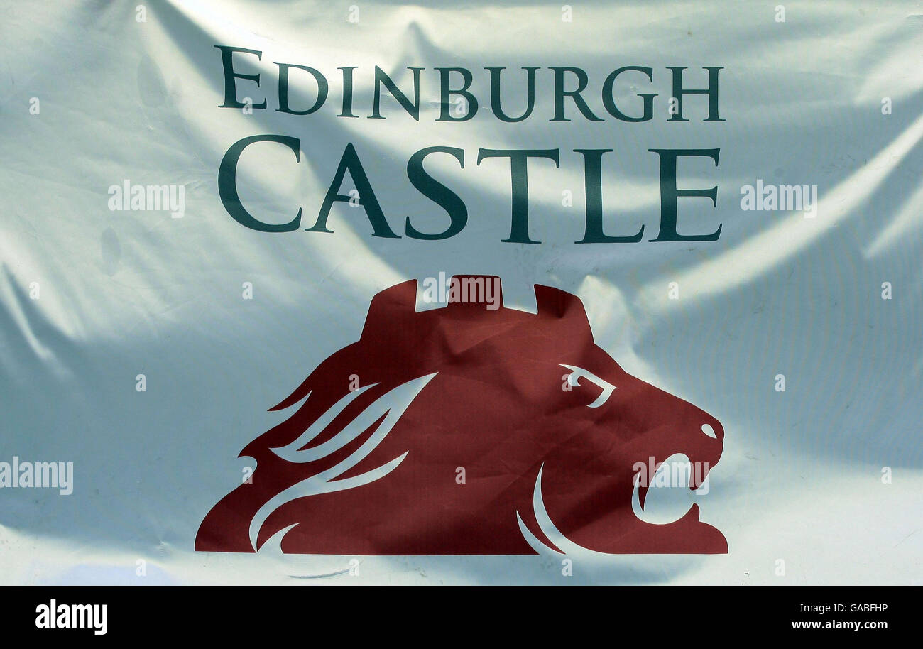 A flag showing the new logo for Edinburgh Castle, launched at the castle which is perched on a 340 million year old volcano in the city centre. Stock Photo