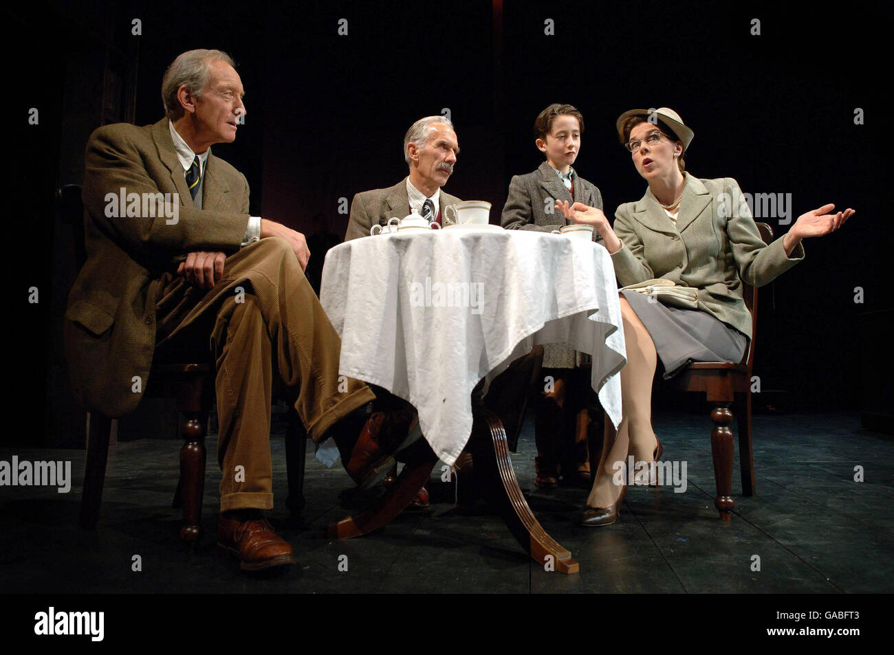 Charles Dance performs as CS Lewis, alongside (right to left) Richard Durden as Major W H Lewis, Jonah Lees as Douglas Gresham and Janie Dee as Joy Gresham, during a rehearsal of Shadowlands at Wyndham's Theatre, London. Stock Photo