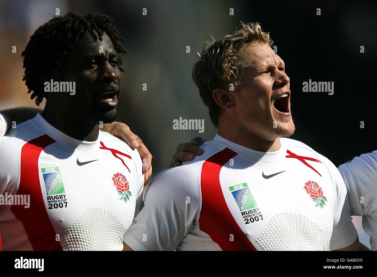 Rugby Union - IRB Rugby World Cup 2007 - Quarter Final - Australia v England - Stade Velodrome. England's Josh Lewsy (r) and Paul Sackey during the national anthem Stock Photo