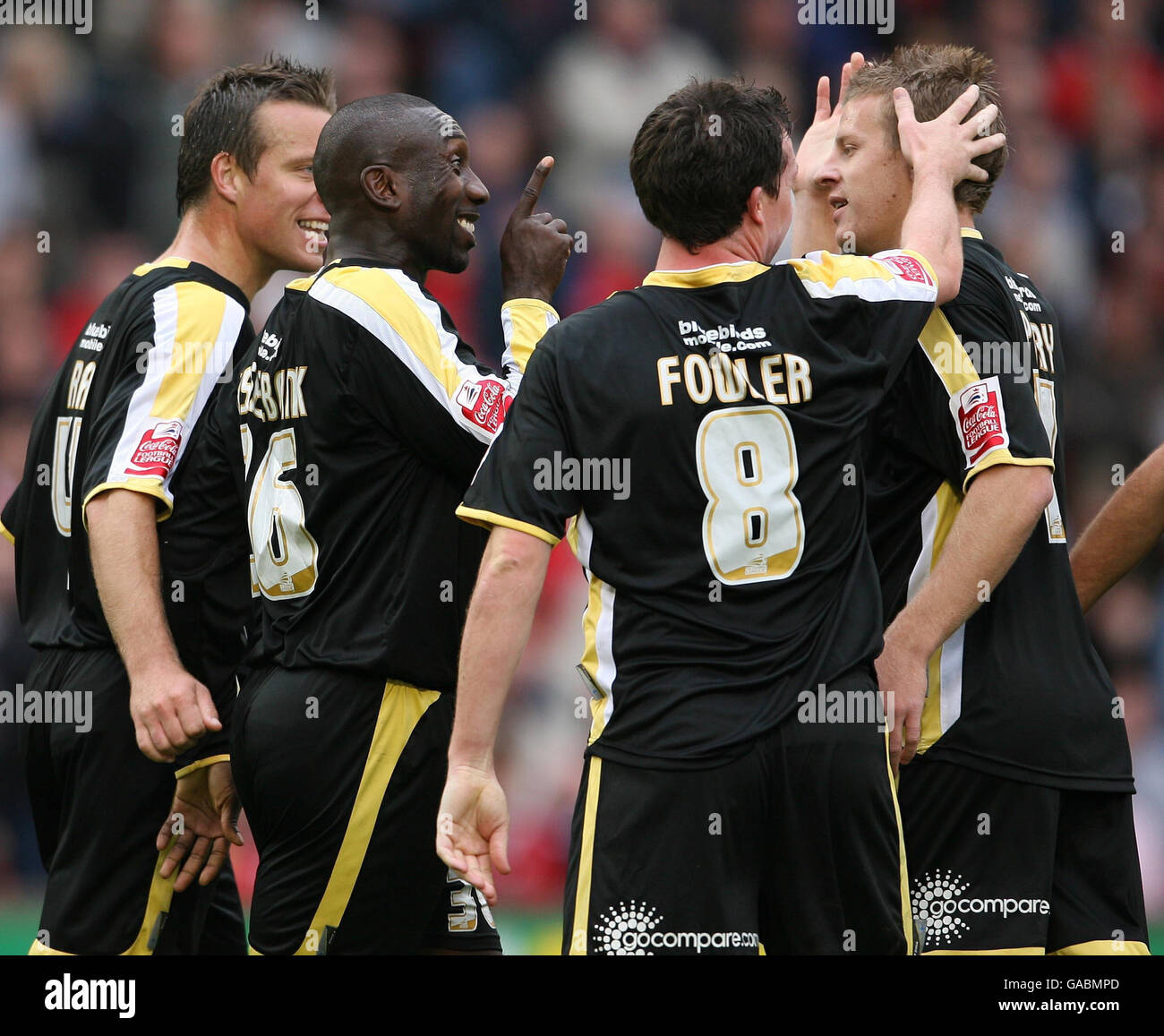 Cardiff Citys Jimmy Floyd Hasselbaink celebrates his goal with team mates during the Coca-Cola Football League Championship match at the Oakwell Ground, Barnsley. Stock Photo