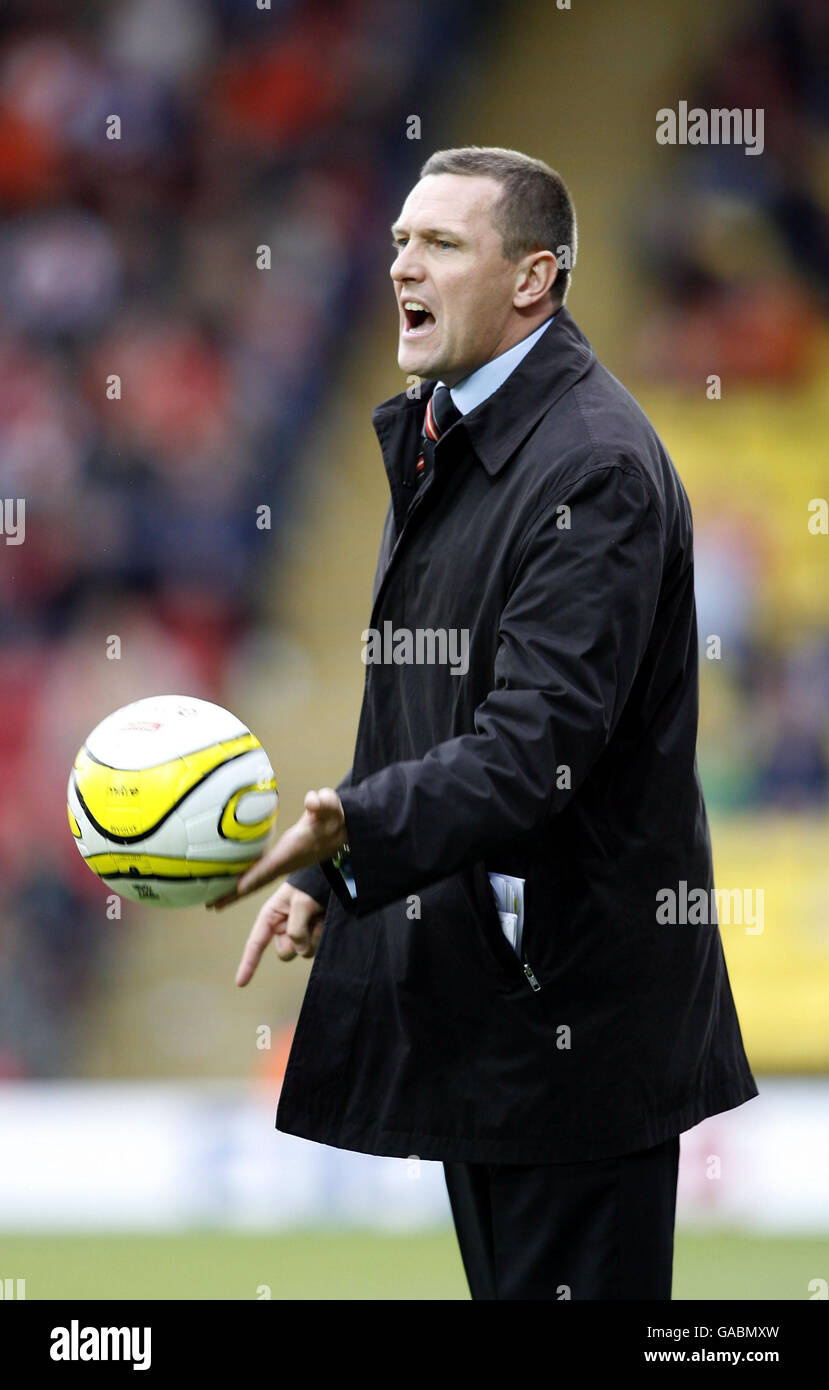 Soccer - Coca-Cola Football League Championship - Watford v Blackpool - Vicarage Road. Watford manager Adrian Boothroyd shouts from the touchline during the Coca-Cola Football League Championship match at Vicarage Road, Watford. Stock Photo