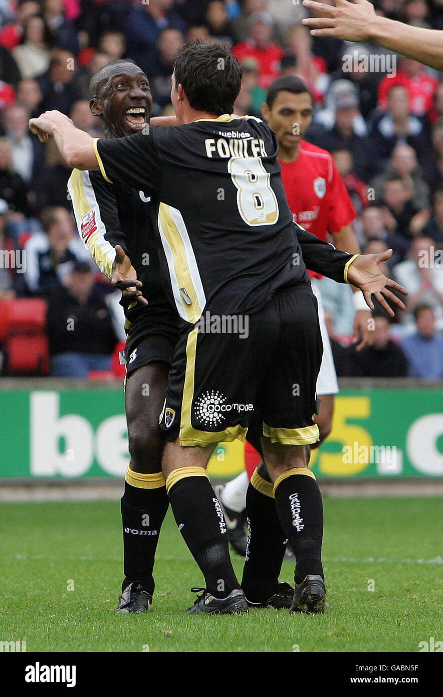 Cardiff City's Jimmy Floyd Hasselbaink celebrates his goal with Robbie Fowler during the Coca-Cola Football League Championship match at the Oakwell Ground, Barnsley. Stock Photo