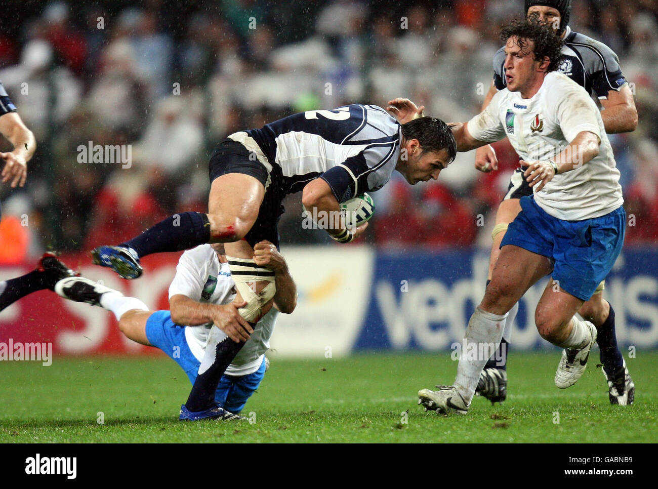 Scotland's Rob Dewey tries to find a way through Italy's defence during the IRB Rugby World Cup Pool C match at Stade Geoffroy-Guichard, St Etienne, France. Stock Photo