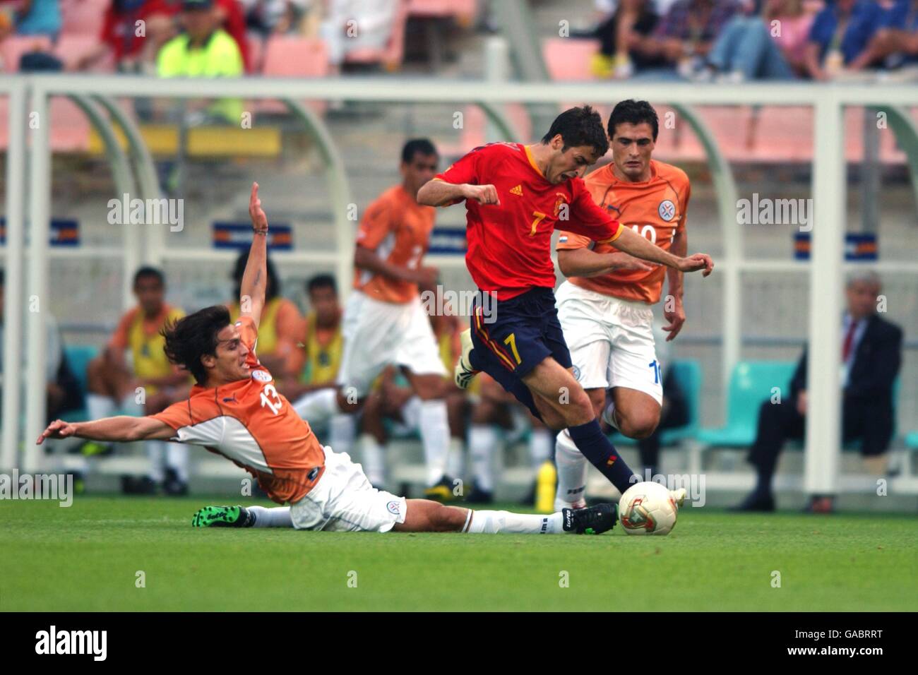 Soccer Fifa World Cup 02 Group B Spain V Paraguay Spain S Raul Is Tackled By Paraguay S Carlos Paredes Stock Photo Alamy