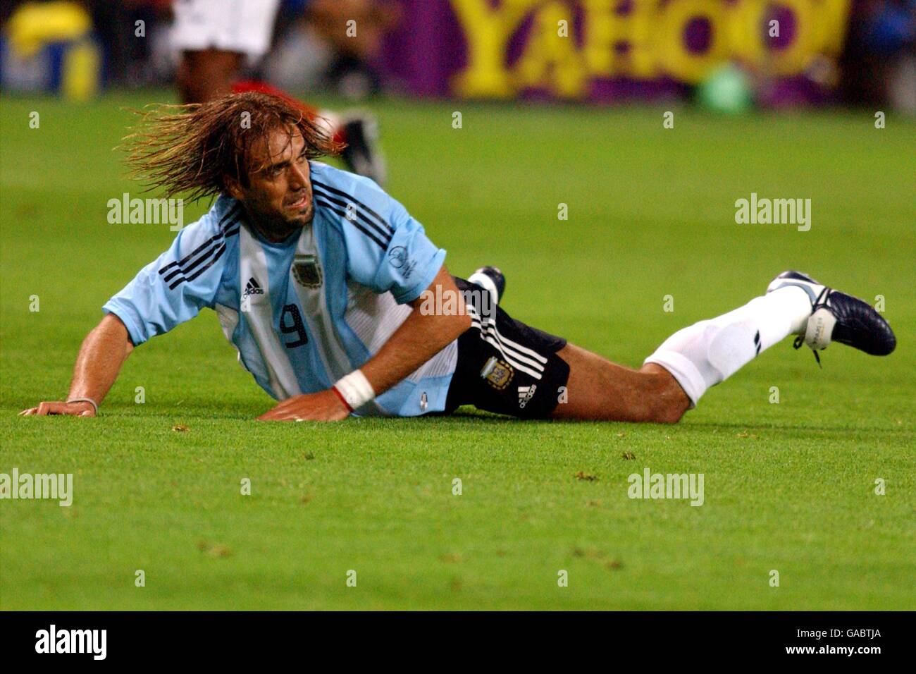 Soccer - FIFA World Cup 2002 - Group F - Argentina v England. Argentina's Gabriel Batistuta lies on the ground after missing a chance against England Stock Photo