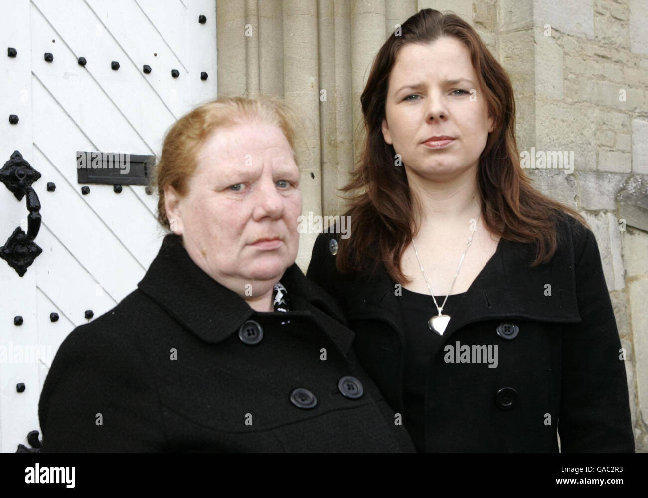 Mother Mrs Jean King (left) and Violet Shabytah sister of Cpl. John Johnston Cosby who died in Iraq. An army corporal told an inquest today it was a 'possibility' he had mistakenly shot dead the British soldier during a firefight with Iraqi insurgents. Stock Photo