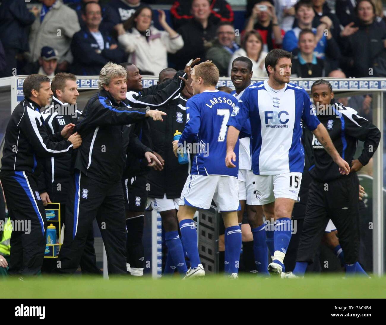 Birmingham players celebrate Olivier Kapo's second goal with their bench to give them a 3-2 lead Stock Photo