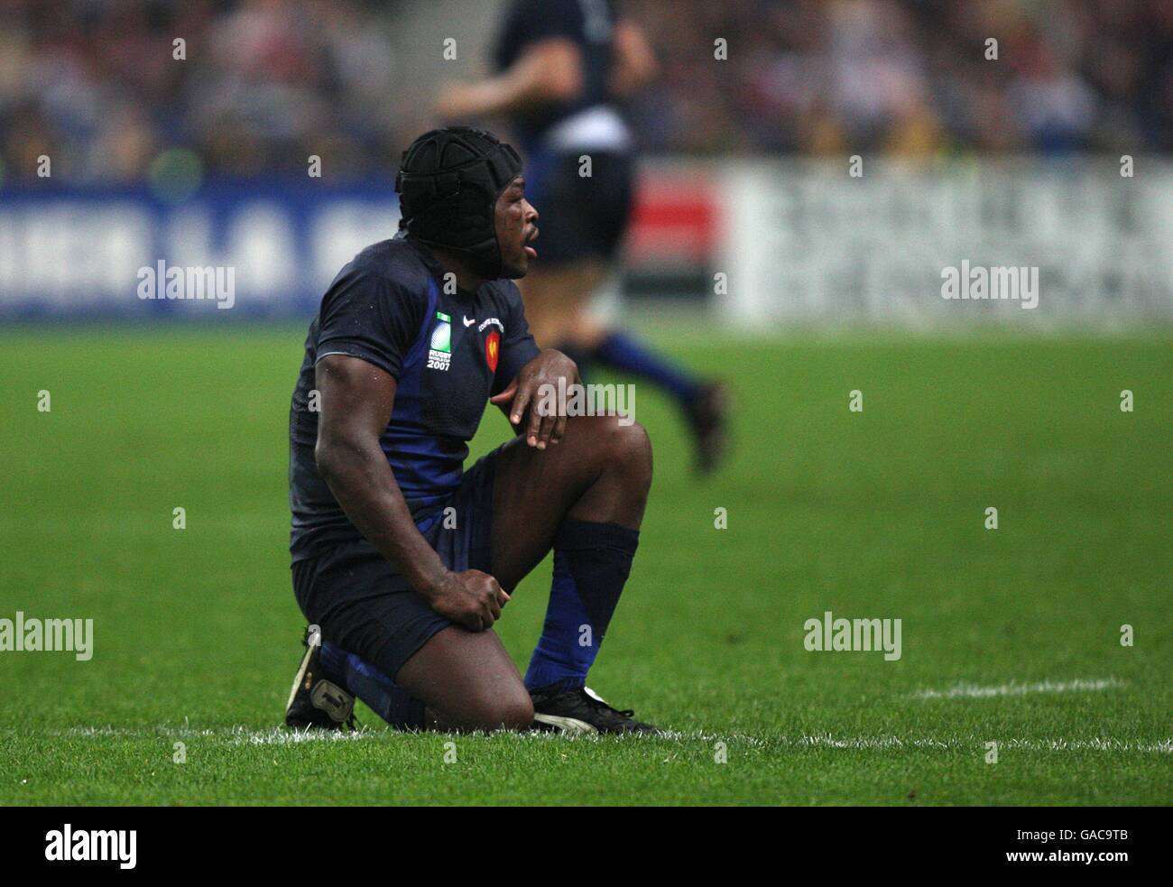 Rugby Union - IRB Rugby World Cup 2007 - Semi Final - England v France - Stade de France. France's Serge Betsen sits dejected Stock Photo