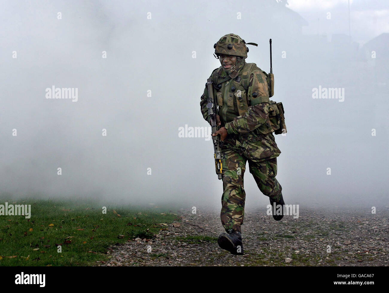 A soldier takes part in a training exercise at Copehill Down Village on Salisbury Plain, Wiltshire. The Army were today demonstrating the latest simulation equipment to train troops to deal with roadside bombs. Stock Photo