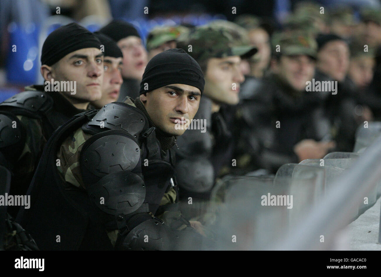 Riot police wait in the stands during the UEFA European Championship ...