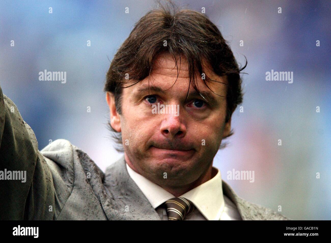 Philippe Troussier the Japan manager waves to the crowd with tears in his eyes after his team were knocked out of the FIFA 2002 World Cup Stock Photo