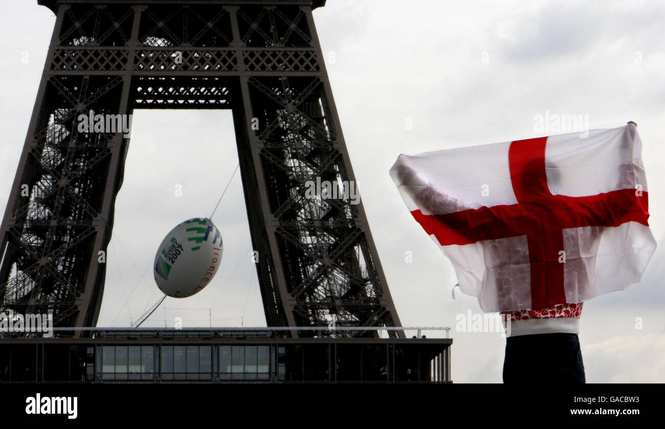 An England Rugby Fan flies the St George Flag in front of the Eiffel ...
