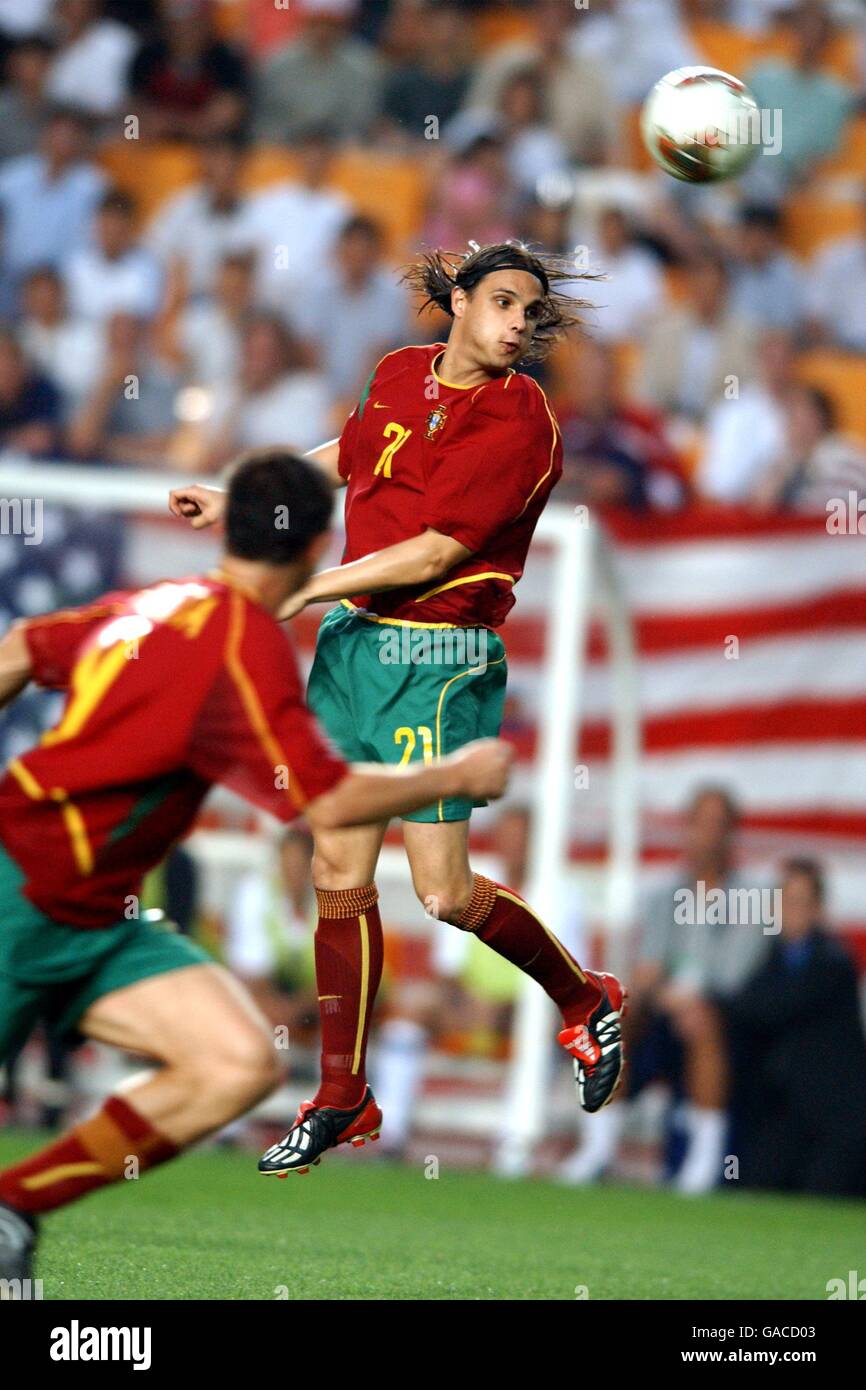 Soccer -FIFA World Cup 2002 - Group D - USA v Portugal. Portugal's Nuno Gomes jumps to head the ball Stock Photo