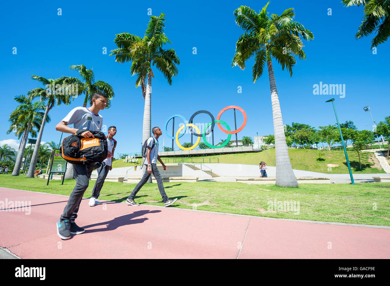 RIO DE JANEIRO - MARCH 18, 2016: Young Brazilians walk in front of ...