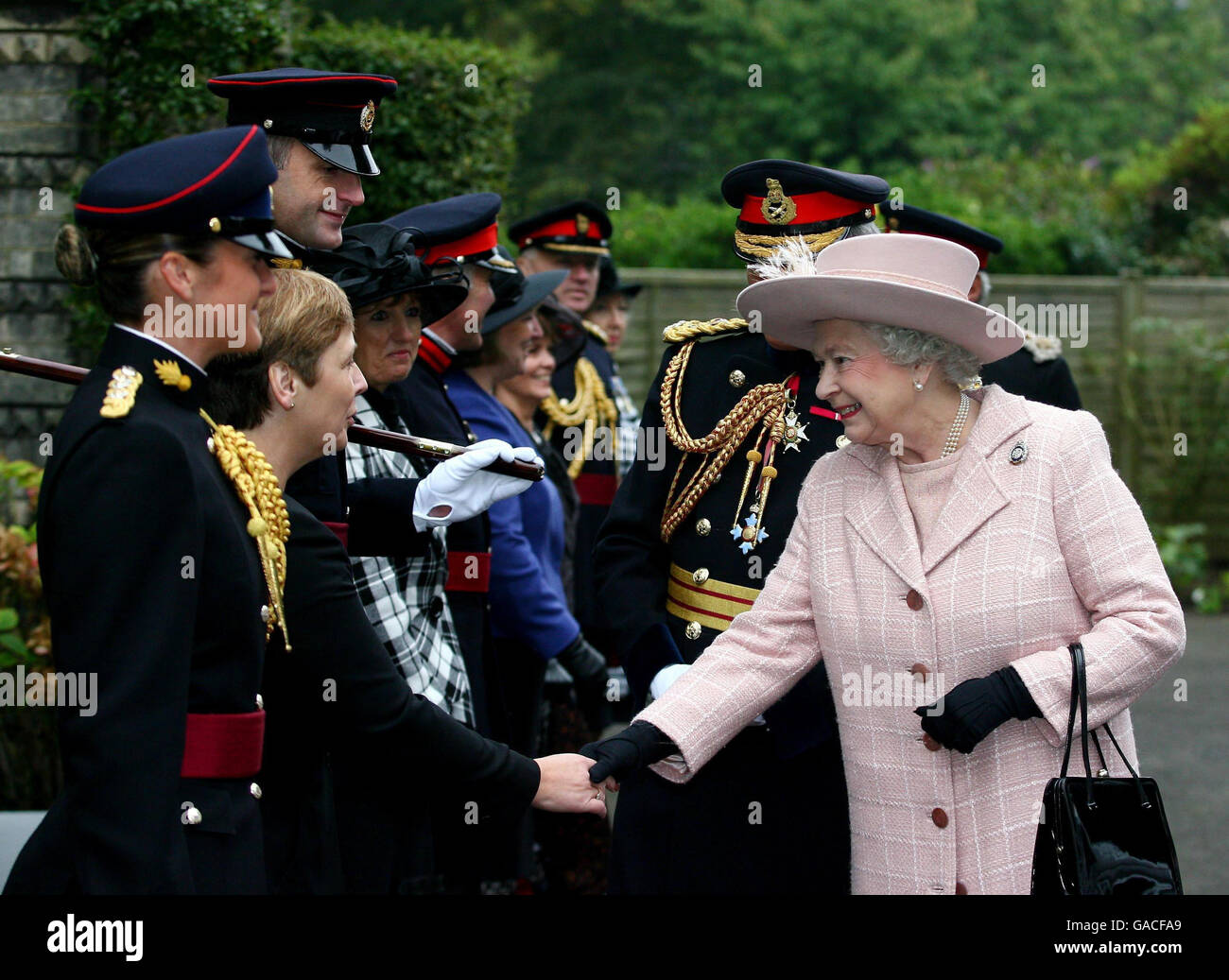 Britain's Queen Elizabeth II greets the welcoming party during a visit to the Corps of Royal Engineers at Brompton Barracks, Chatham, Kent. Stock Photo