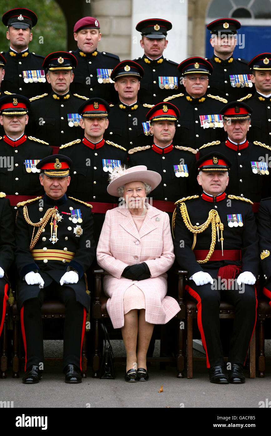 Britain's Queen Elizabeth II poses for a photograph during a visit to the Corps of Royal Engineers at Brompton Barracks, Chatham, Kent. Stock Photo