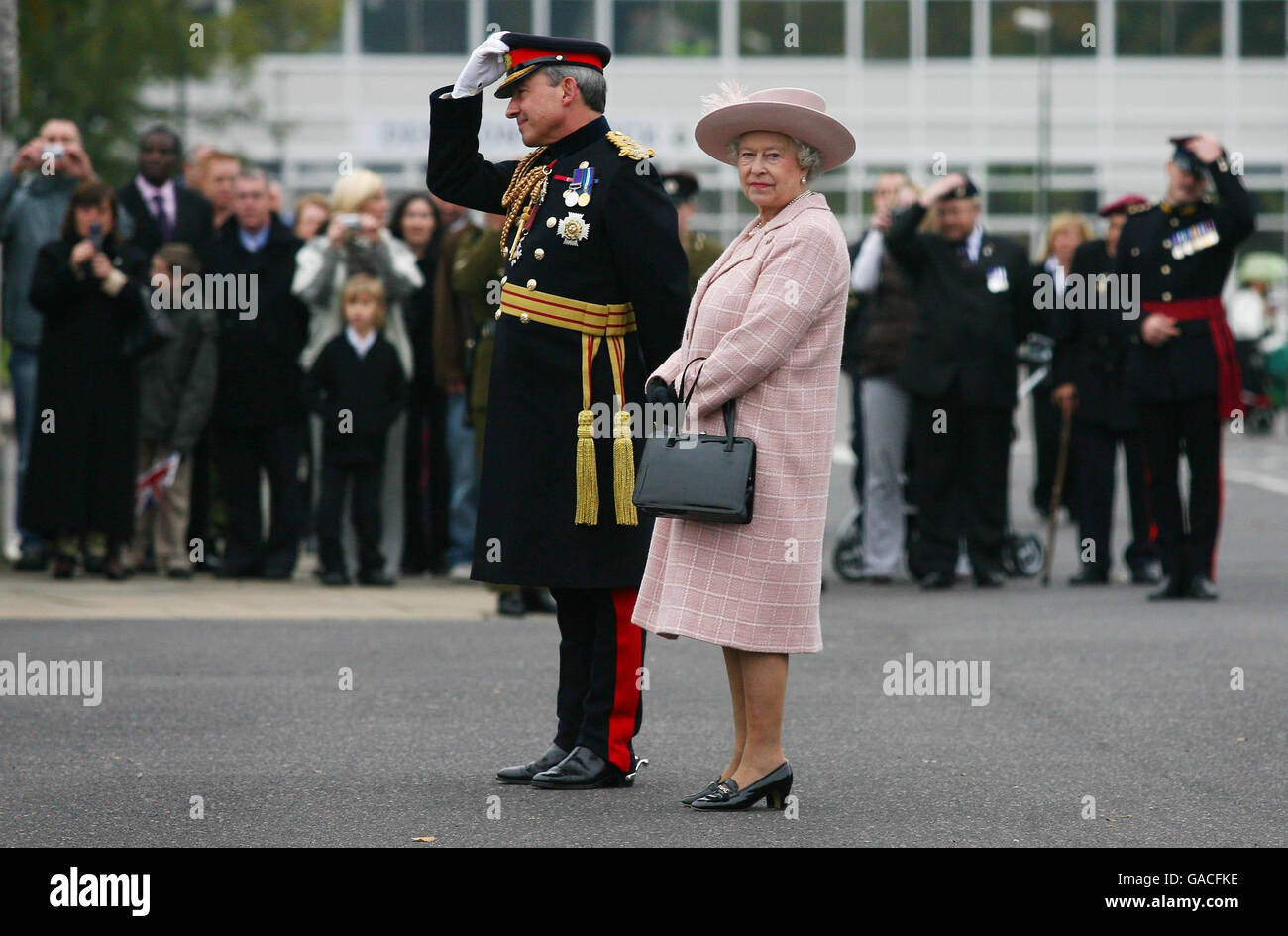 Britain's Queen Elizabeth II accompanied by Chief Royal Engineer Sir Kevin O'Donoghue at the end of a visit to the Corps of Royal Engineers at Brompton Barracks, Chatham, Kent. Stock Photo