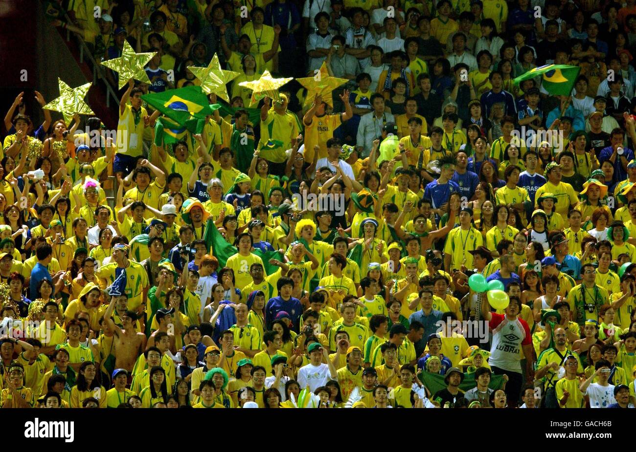 Brazil fans celebrate with 5 stars after winning the World Cup for the fifth time Stock Photo