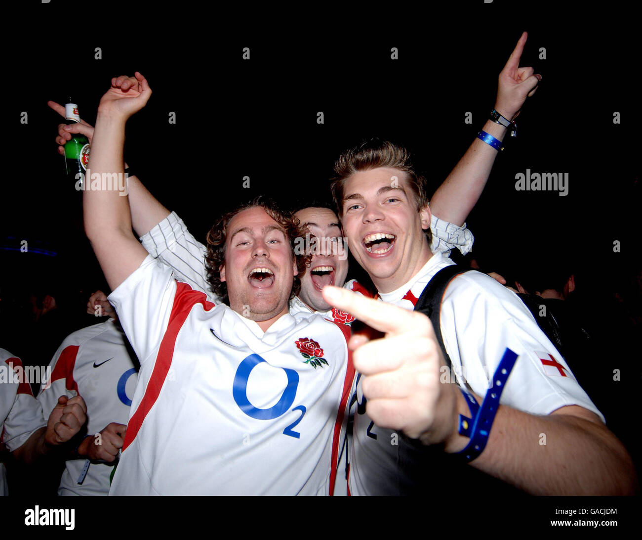 England fans celebrate after England won the World Cup semi-final, which was being shown on a giant screen in the O2 Arena in east London. Stock Photo