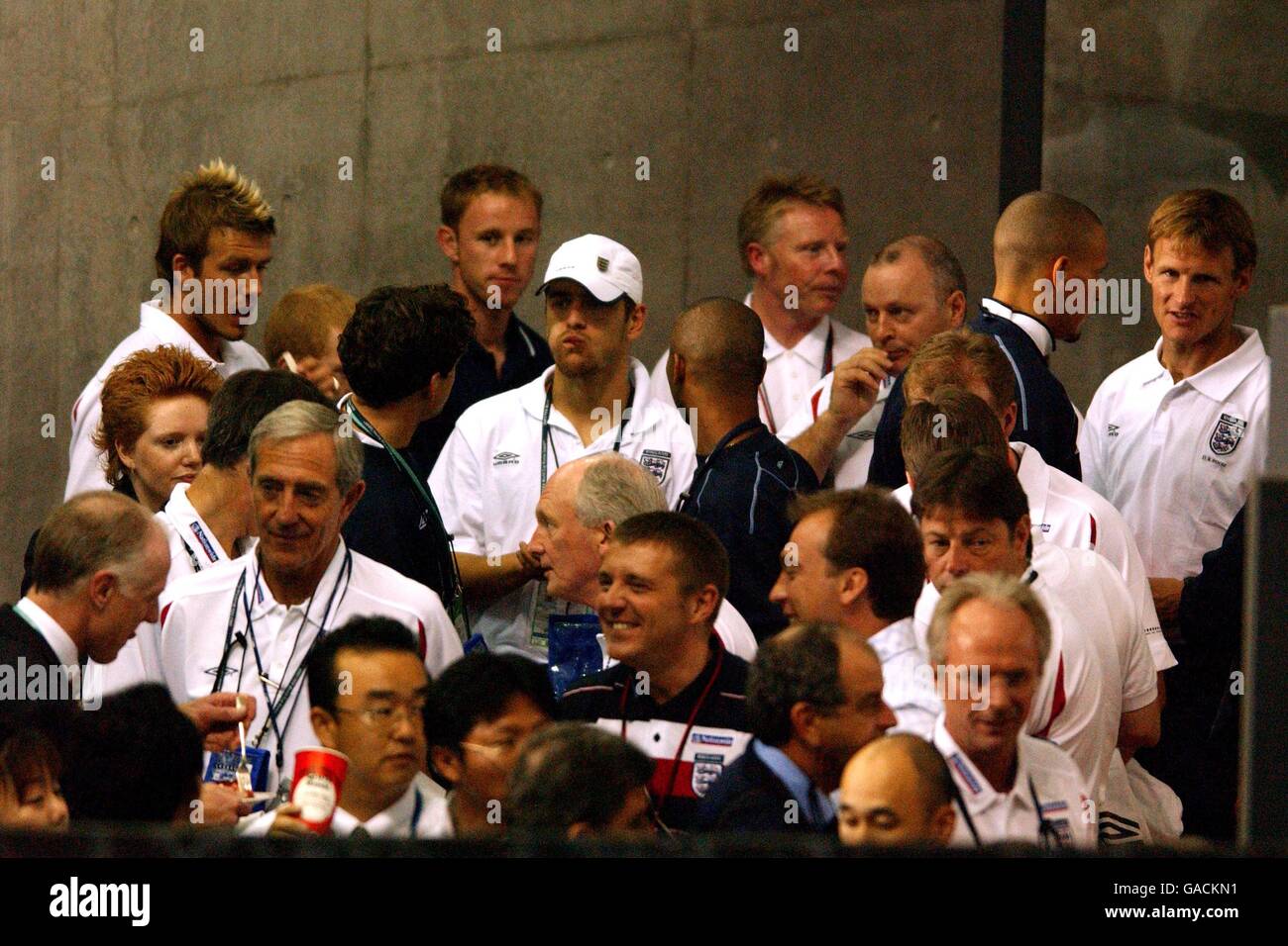 The England team in the Kobe Stadium watching their quarter final opponents in the second round in Kobe, Japan Stock Photo