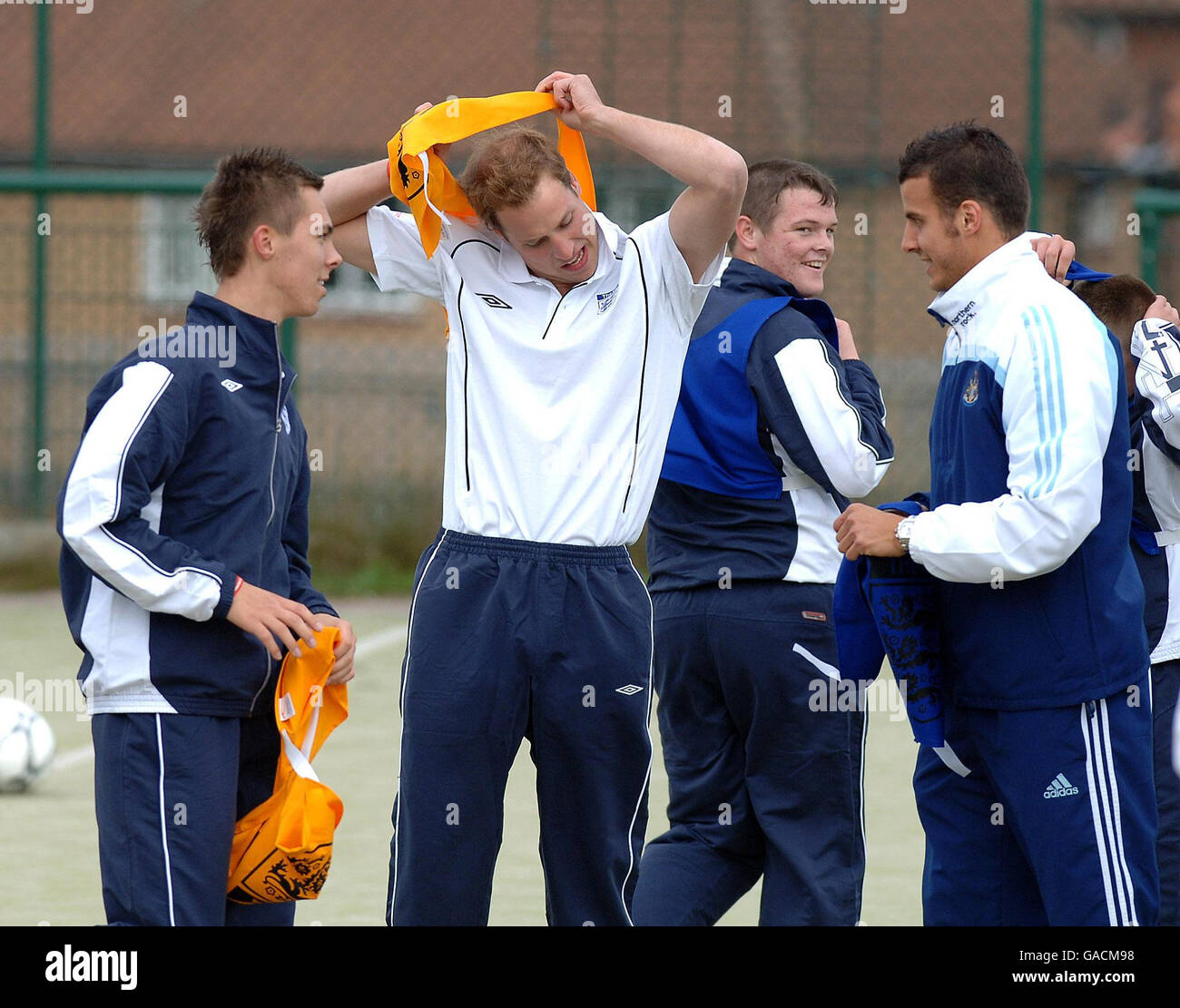 Prince William gets ready to play football alongside youngsters during a visit to the FA's Hat-Trick Project at West Gate Community College Centre for Sport, Newcastle. Stock Photo