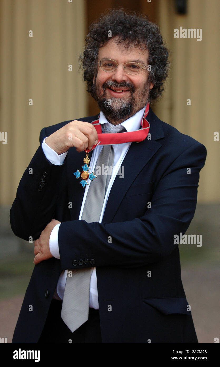 Dramatist Stephen Poliakoff after he received his CBE, Commander of the British Empire, medal from Queen Elizabeth II at Buckingham Palace. Stock Photo