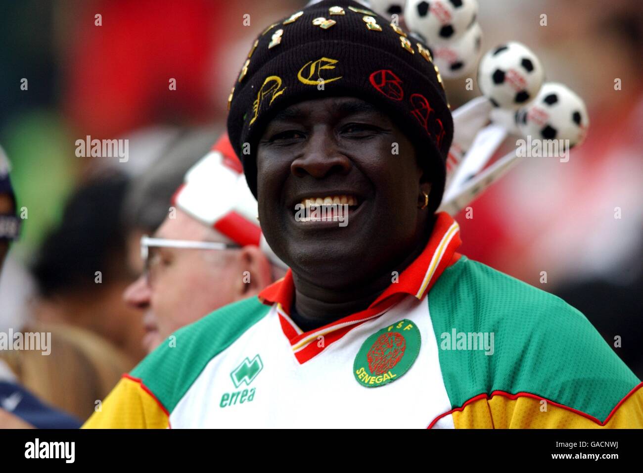 Soccer -FIFA World Cup 2002 - Group D - USA v Portugal. A Senegal fan watches the game Stock Photo