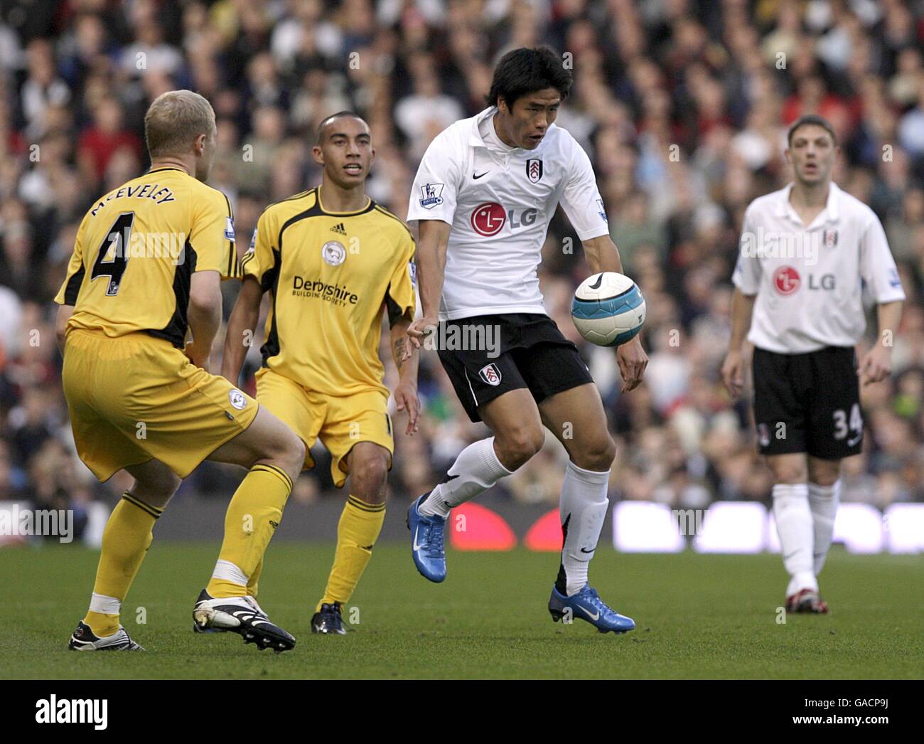 Fulhams seol ki hyeon and derby countys james mceveley in action hires