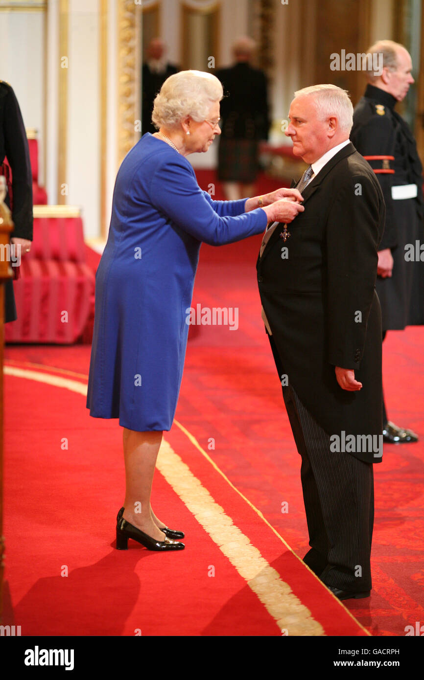 Mr. Barry Jenkins, from Bexley, is made an OBE by The Queen at Buckingham Palace. Stock Photo