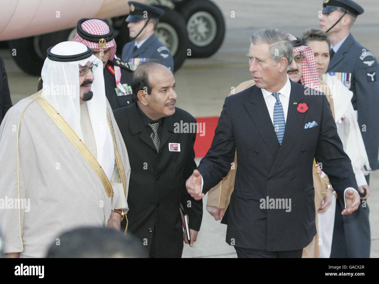 King Abdullah of Saudi Arabia (left) is greeted by The Prince of Wales at Heathrow airport. Stock Photo