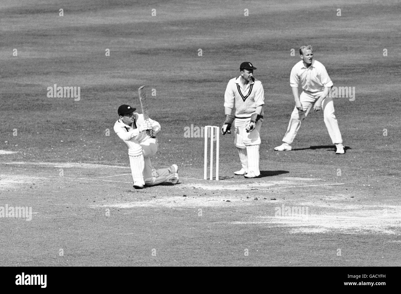 Yorkshire's Geoff Boycott (l) clips the ball away to leg Stock Photo