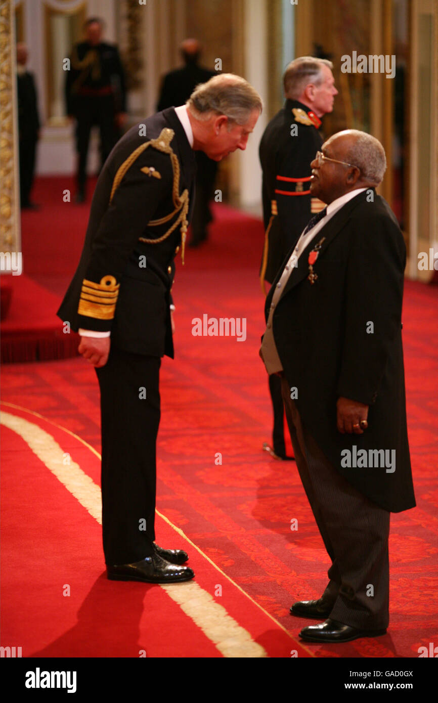 Mr. Neville White from Luton is made an MBE by the Prince of Wales at