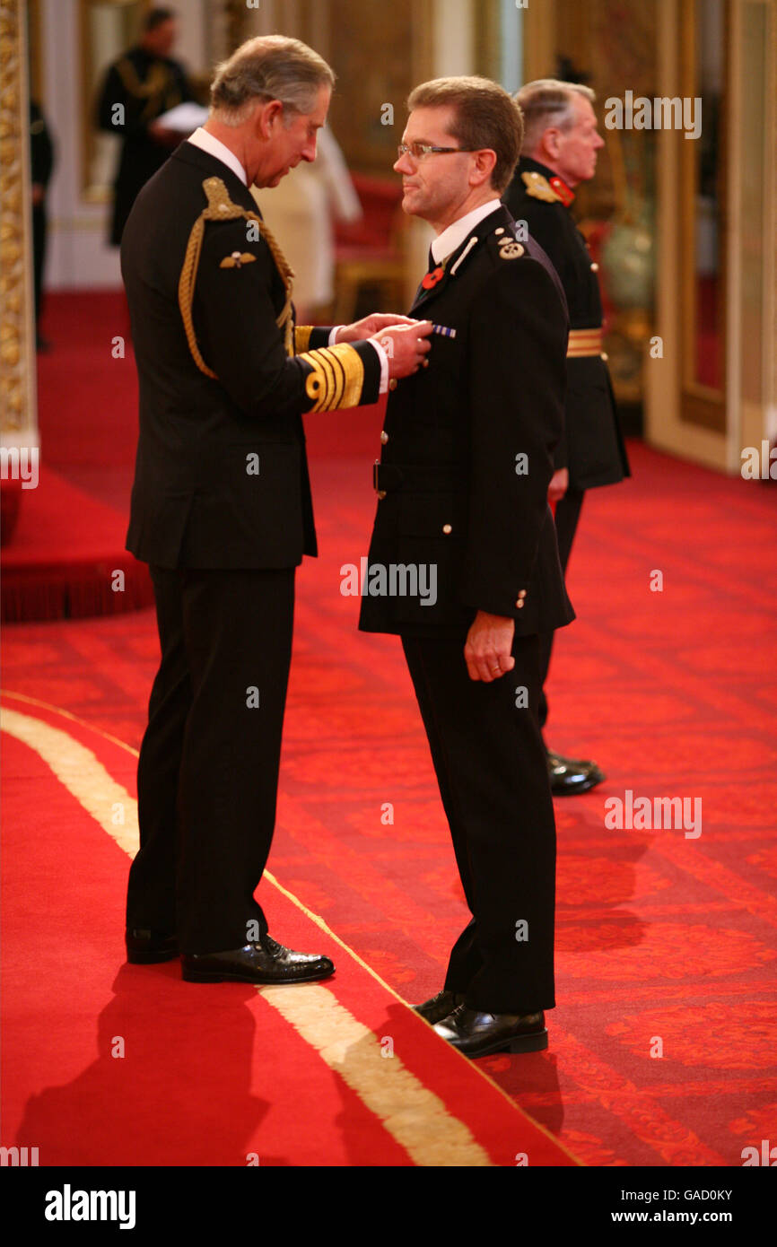 Mr. James Barker-McCardle receives The Queen's Police Medal from the Prince of Wales at Buckingham Palace. This picture must be credited to PA Photos. Stock Photo