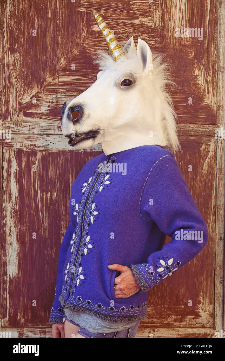 Girl wearing unicorn head hires stock photography and images Alamy