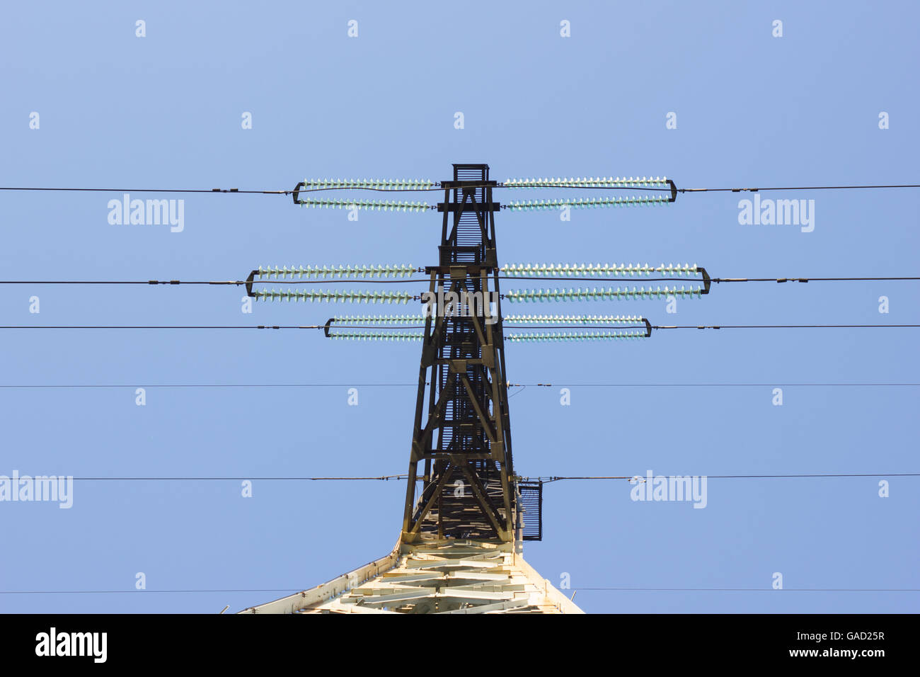 electric insulator on the background of blue sky Stock Photo