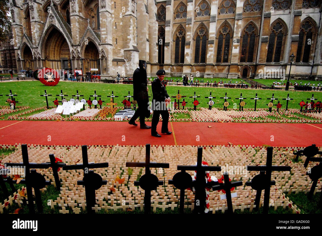Veterans walk through field remembrance westminster abbey hires stock
