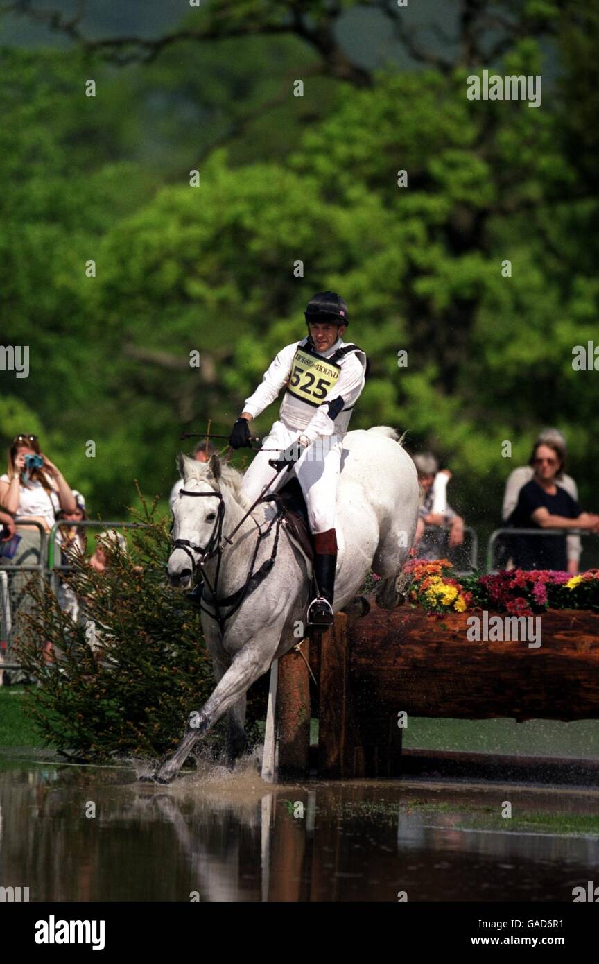 Equestrianism - Chatsworth Horse Trials. Ian Stark takes a jump on Stanwick Ghost Stock Photo