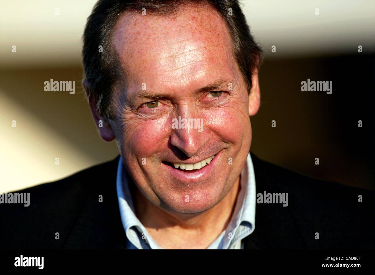 Liverpool's Manager Gerard Houllier is all smiles before the game against Le Havre Stock Photo