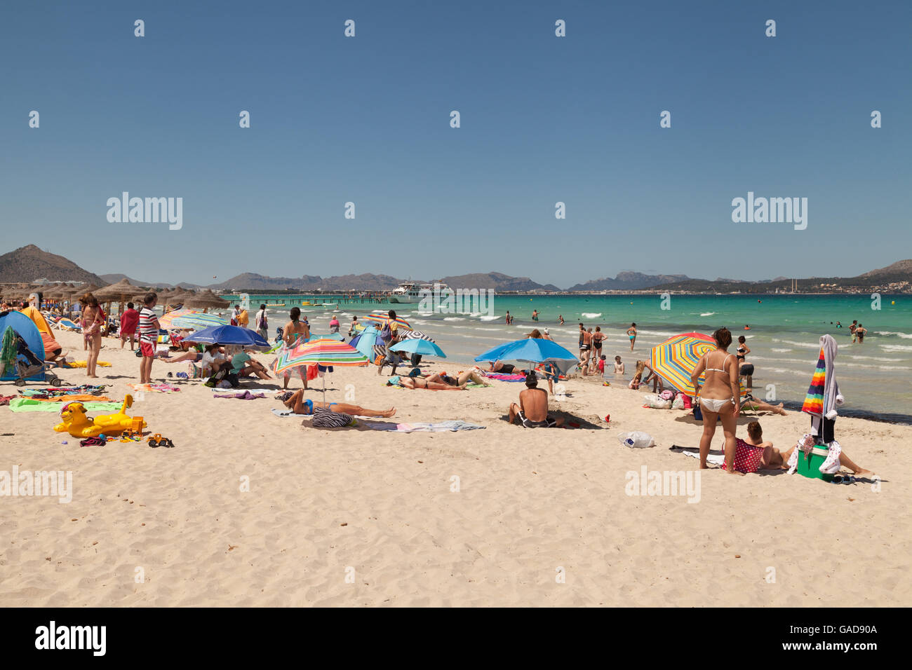 Sunbathers on playa de Muro beach, near Alcudia, Mallorca ( Majorca ), Balearic Islands, Spain Europe Stock Photo
