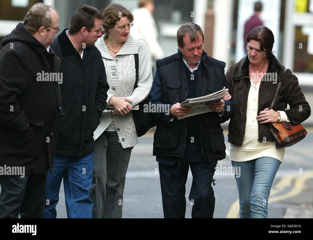 Vicky Hamilton's father Michael Hamilton (second from right) carries a