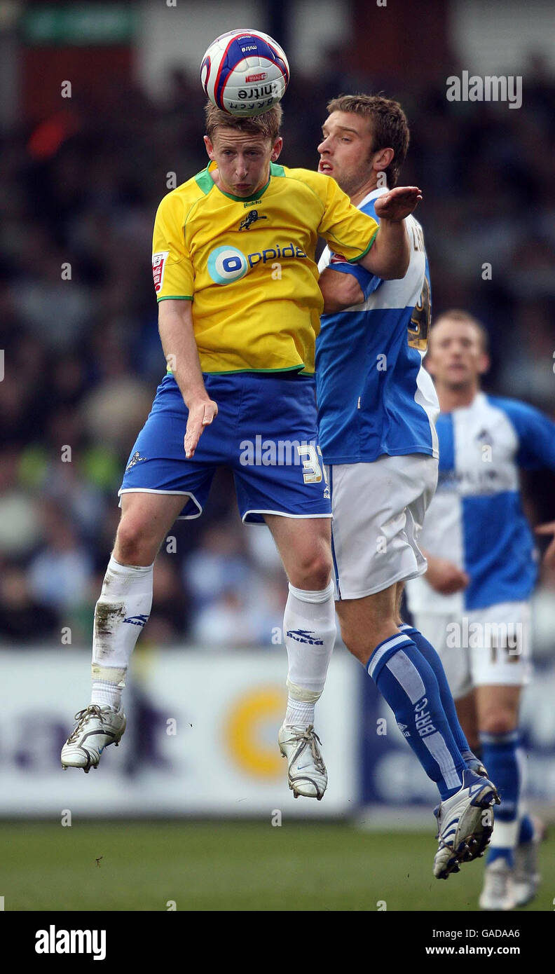 Bristol Rovers' Rickie Lambert and Millwall's Bryan Hodge during the Coca-Cola Football League One match at the Memorial Stadium, Bristol. Stock Photo