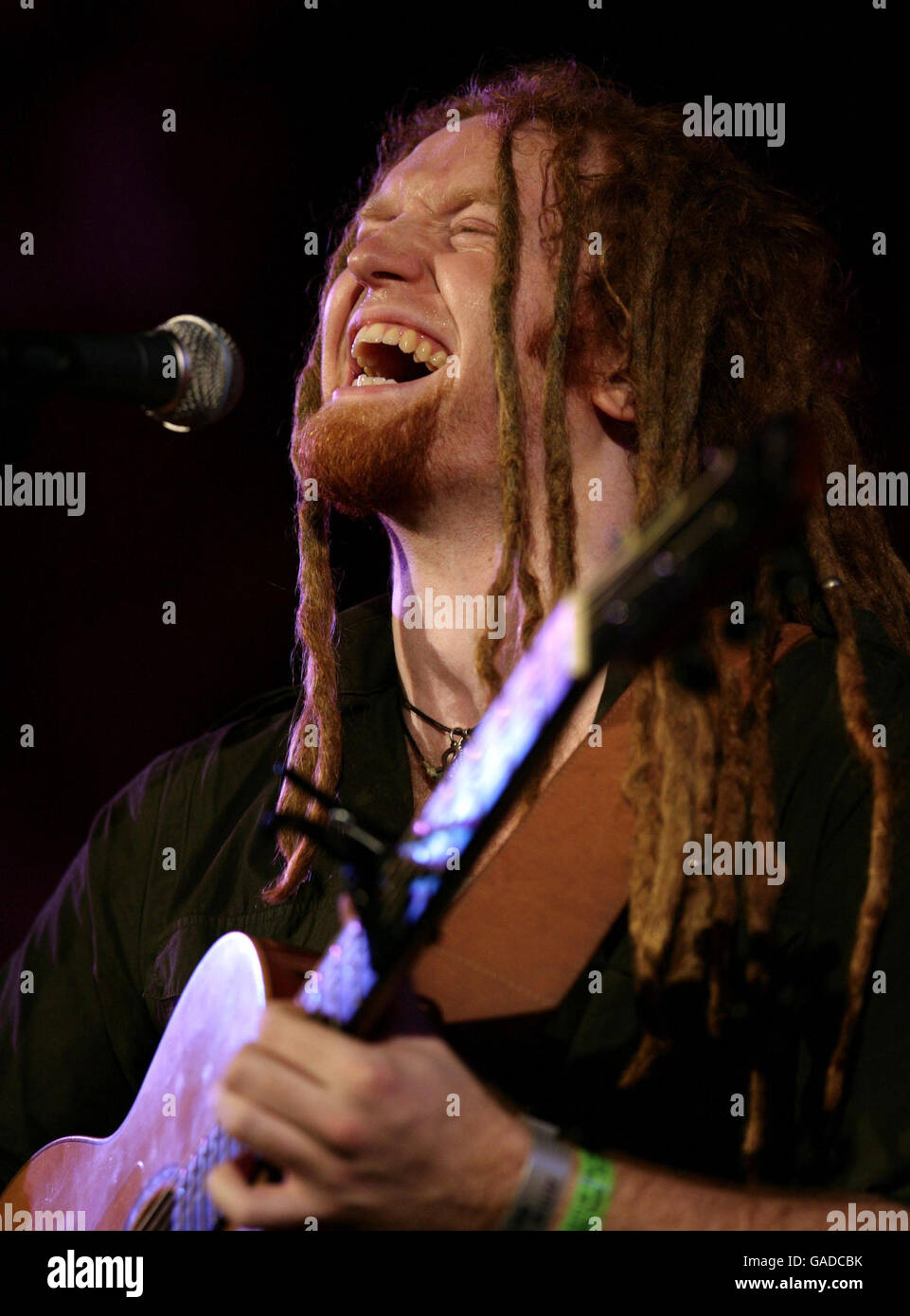 Newton Faulkner performing on stage at the Union Chapel in Islington, north London, as part of the Little Noise Sessions week of gigs in aid of the charity Mencap. Stock Photo