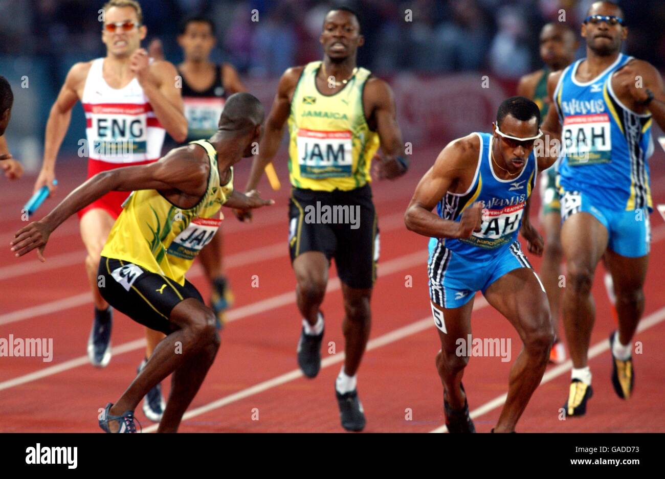 Commonwealth Games - Manchester 2002 - Athletics - Mens 4 x 400m Final. Baton change in the 4 x 400 final Stock Photo