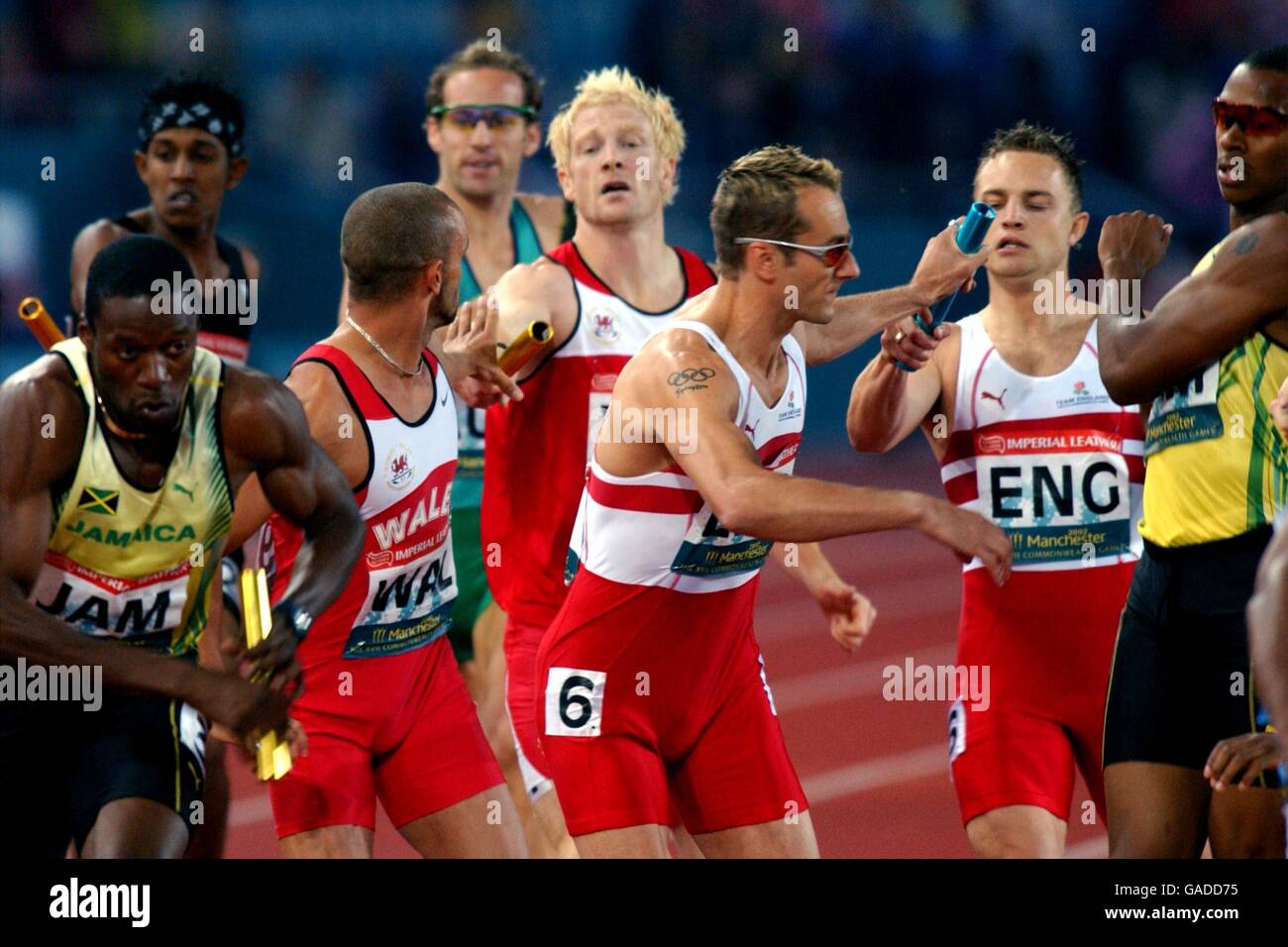 Commonwealth Games - Manchester 2002 - Athletics - Mens 4 x 400m Final. Baton change in the 4 x 400 final Stock Photo